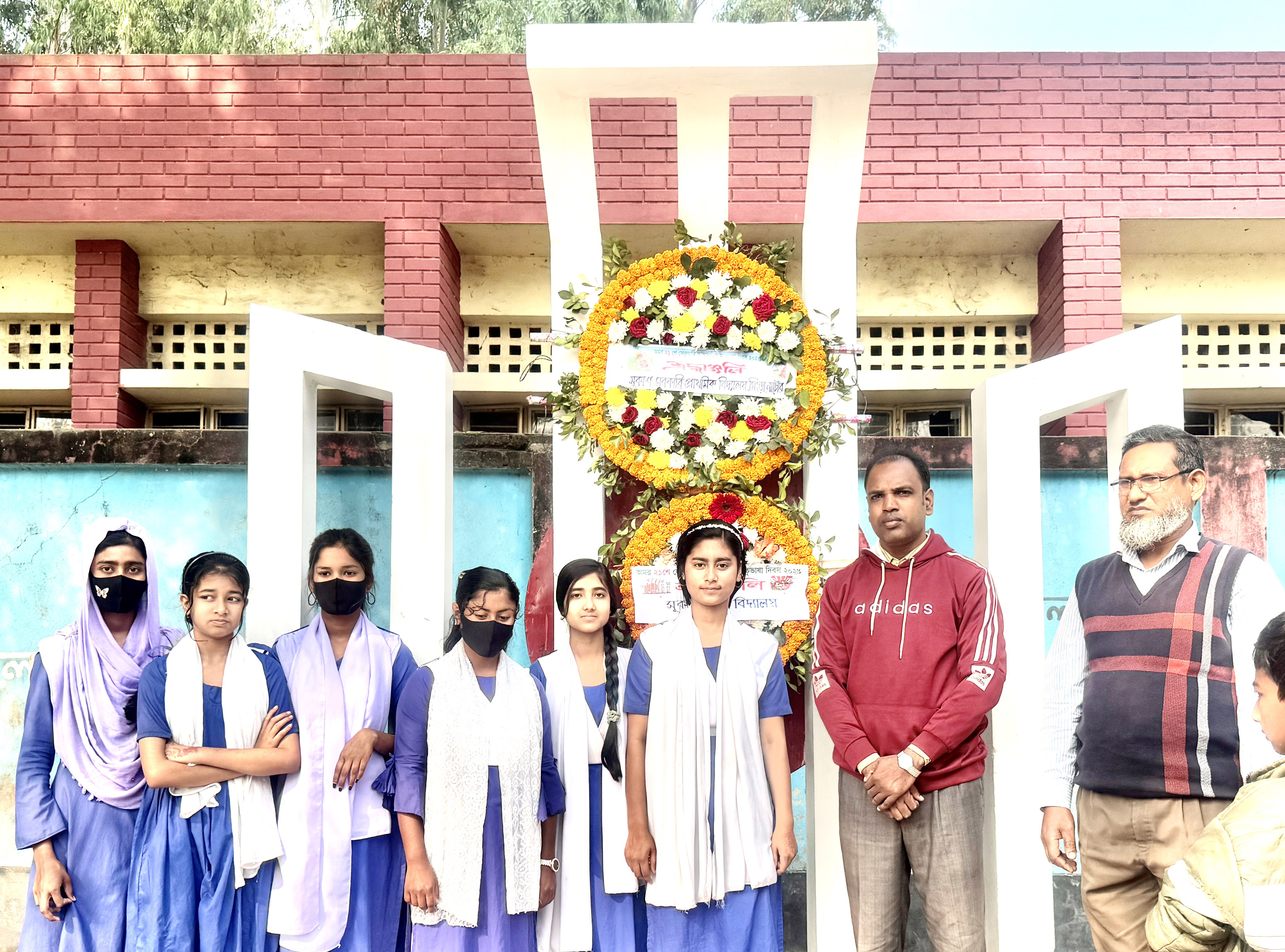 শহীদ মিনারে ফুল দেওয়া...